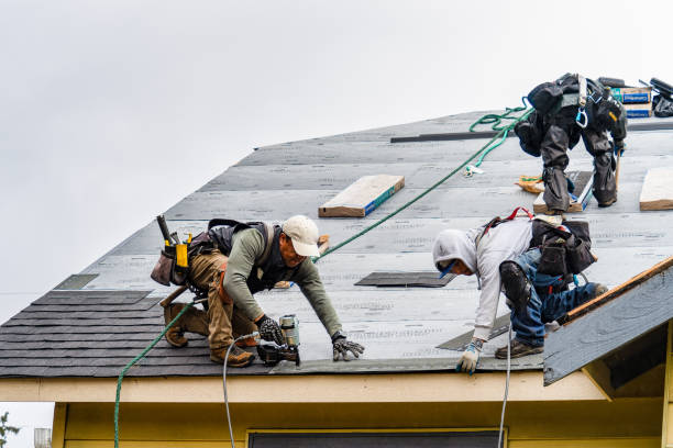 Professional Gutter Installation technician working in Midland, PA